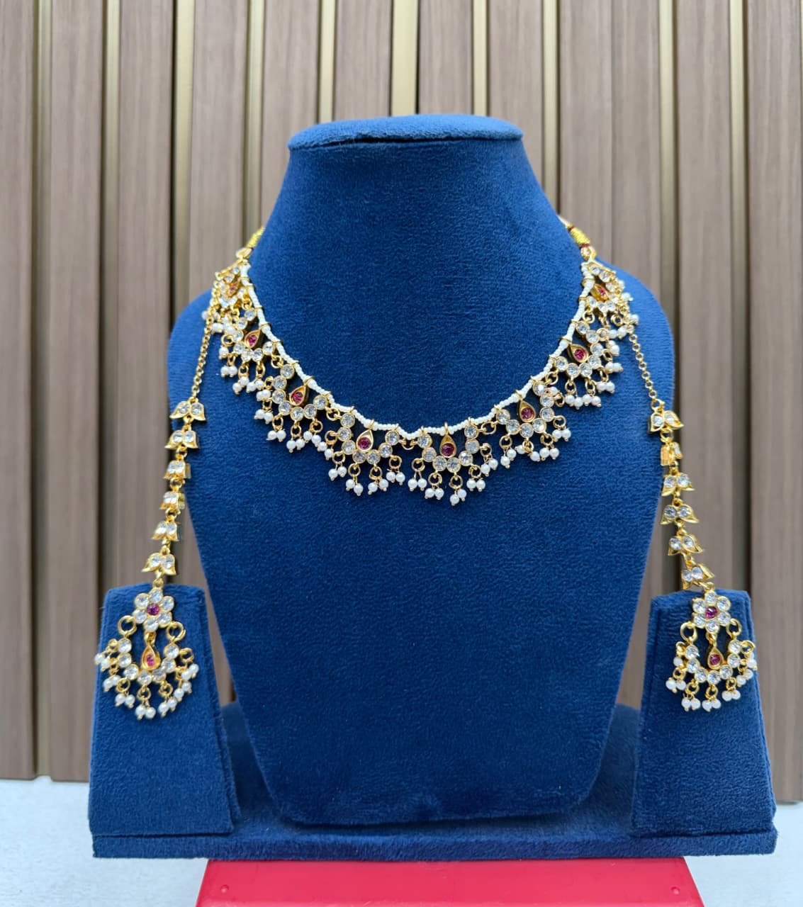 Beautiful kundan necklace with earrings and attached ear chain